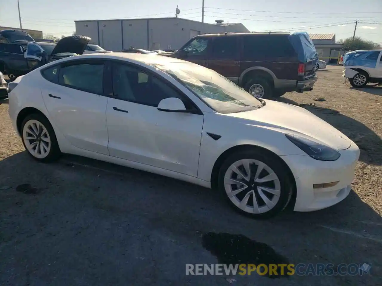 4 Photograph of a damaged car 5YJ3E1EA4NF257743 TESLA MODEL 3 2022