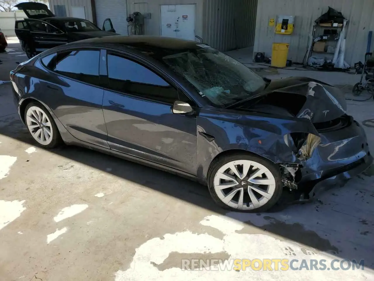 4 Photograph of a damaged car 5YJ3E1EA4NF285493 TESLA MODEL 3 2022