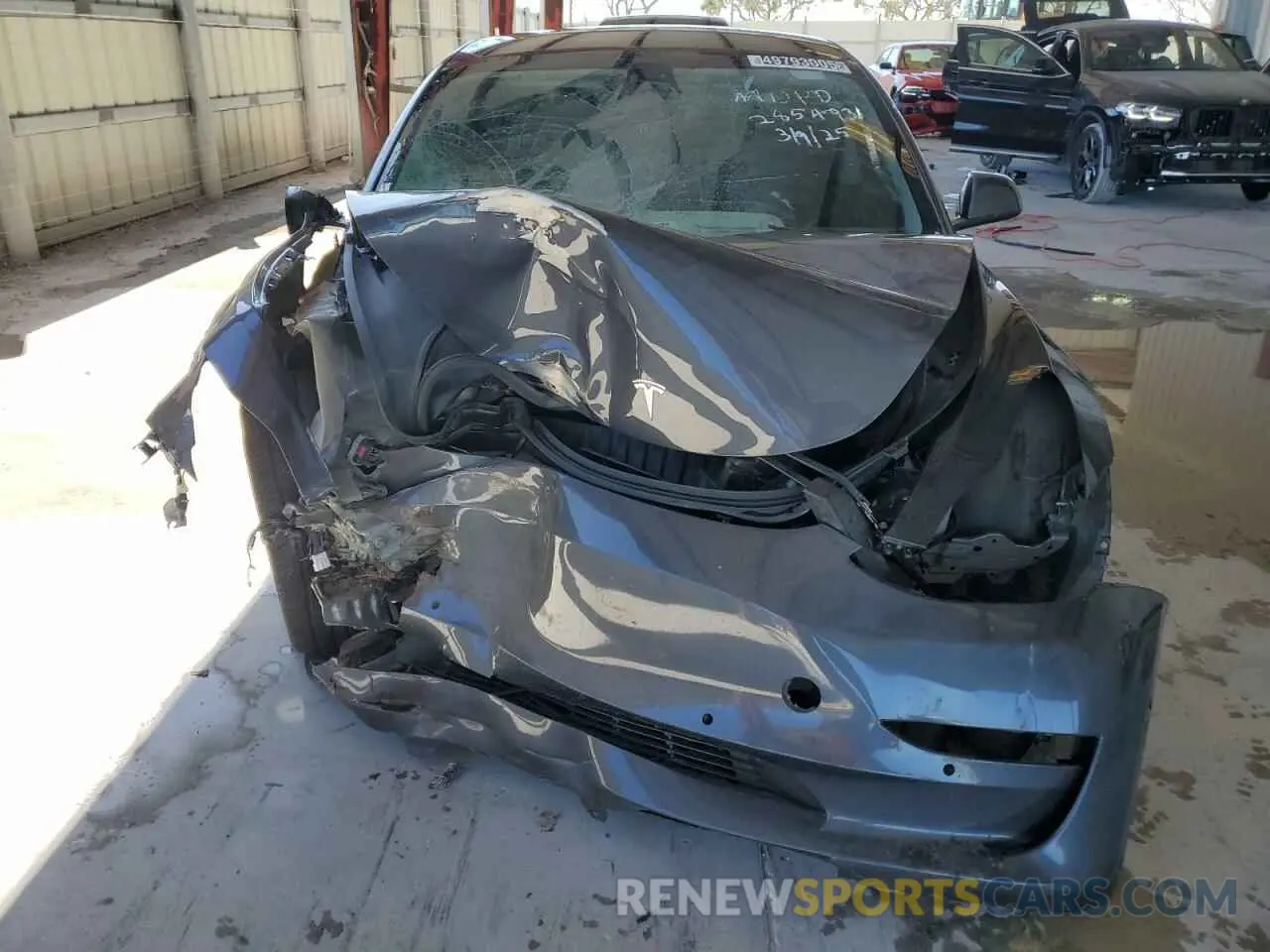 5 Photograph of a damaged car 5YJ3E1EA4NF285493 TESLA MODEL 3 2022