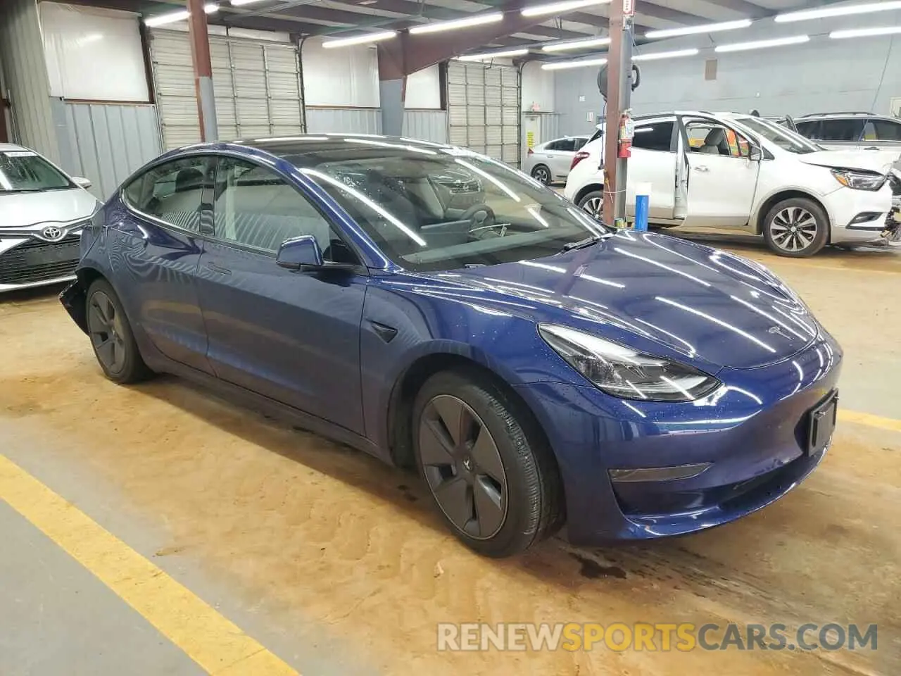 4 Photograph of a damaged car 5YJ3E1EA4NF288460 TESLA MODEL 3 2022