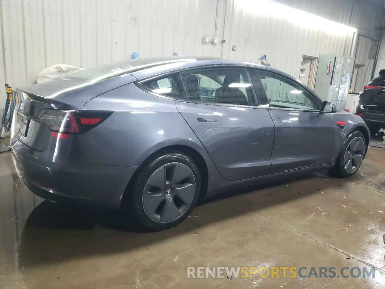 3 Photograph of a damaged car 5YJ3E1EA4NF291231 TESLA MODEL 3 2022