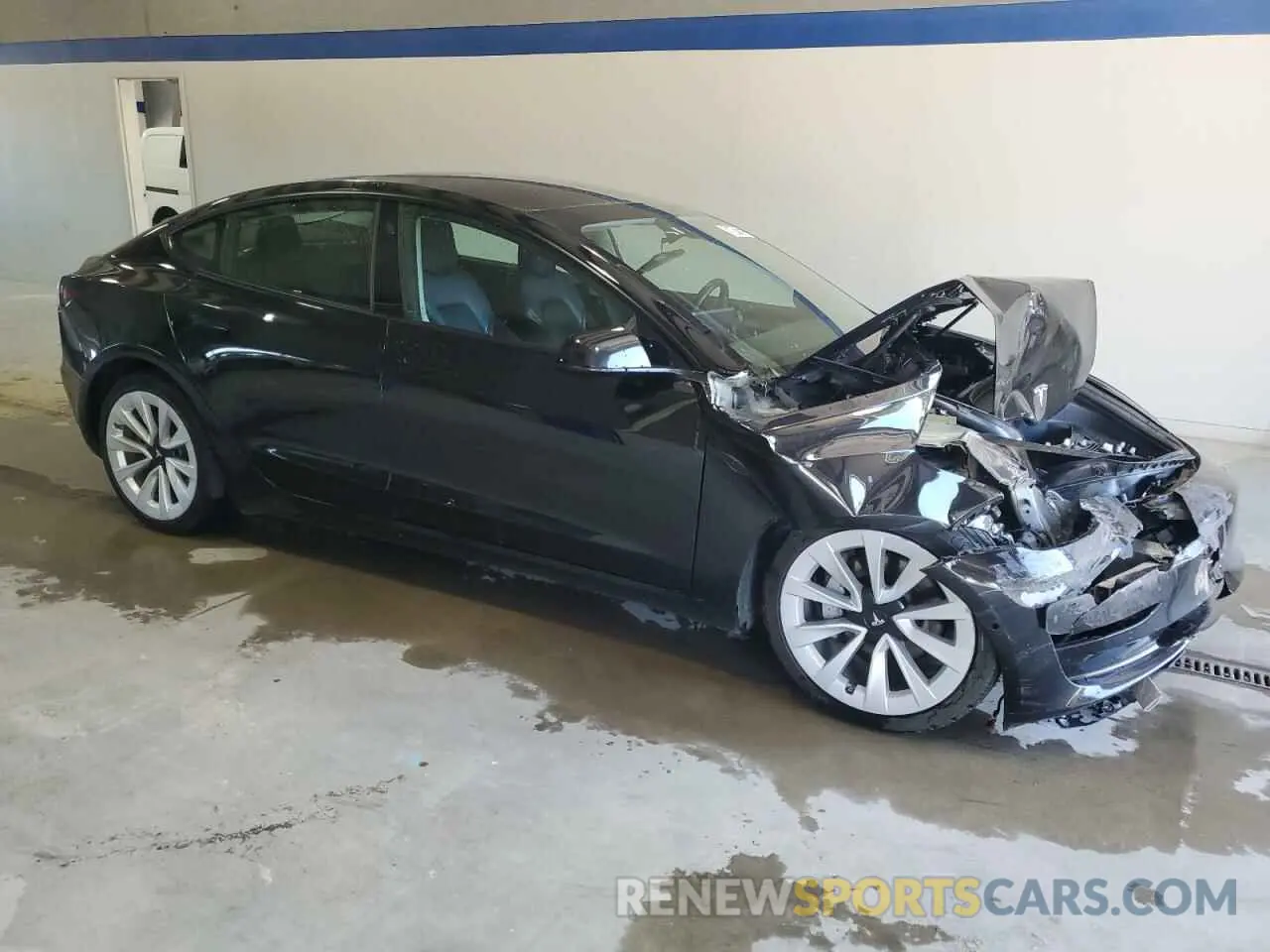 4 Photograph of a damaged car 5YJ3E1EA4NF304611 TESLA MODEL 3 2022