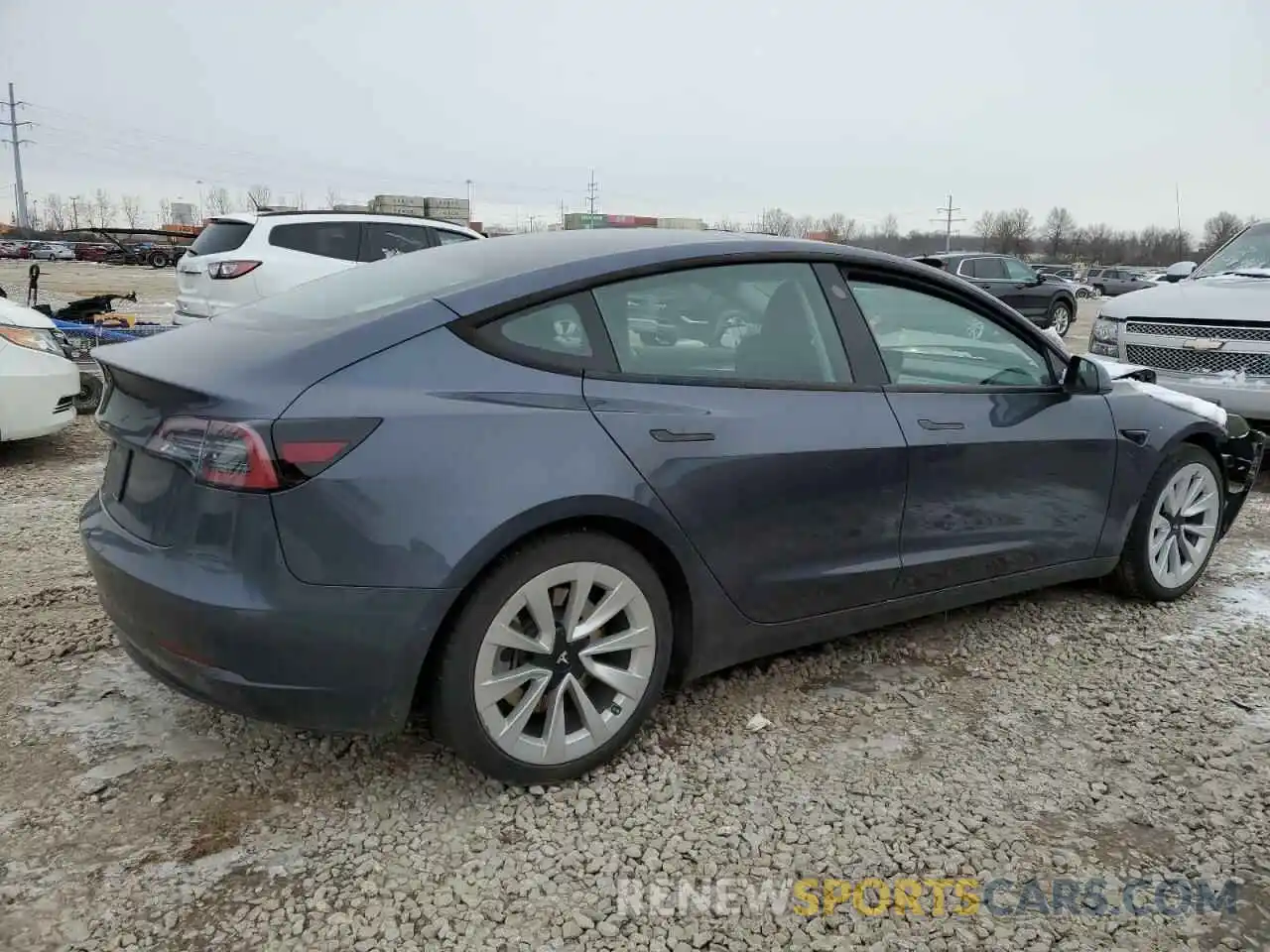 3 Photograph of a damaged car 5YJ3E1EA4NF311879 TESLA MODEL 3 2022