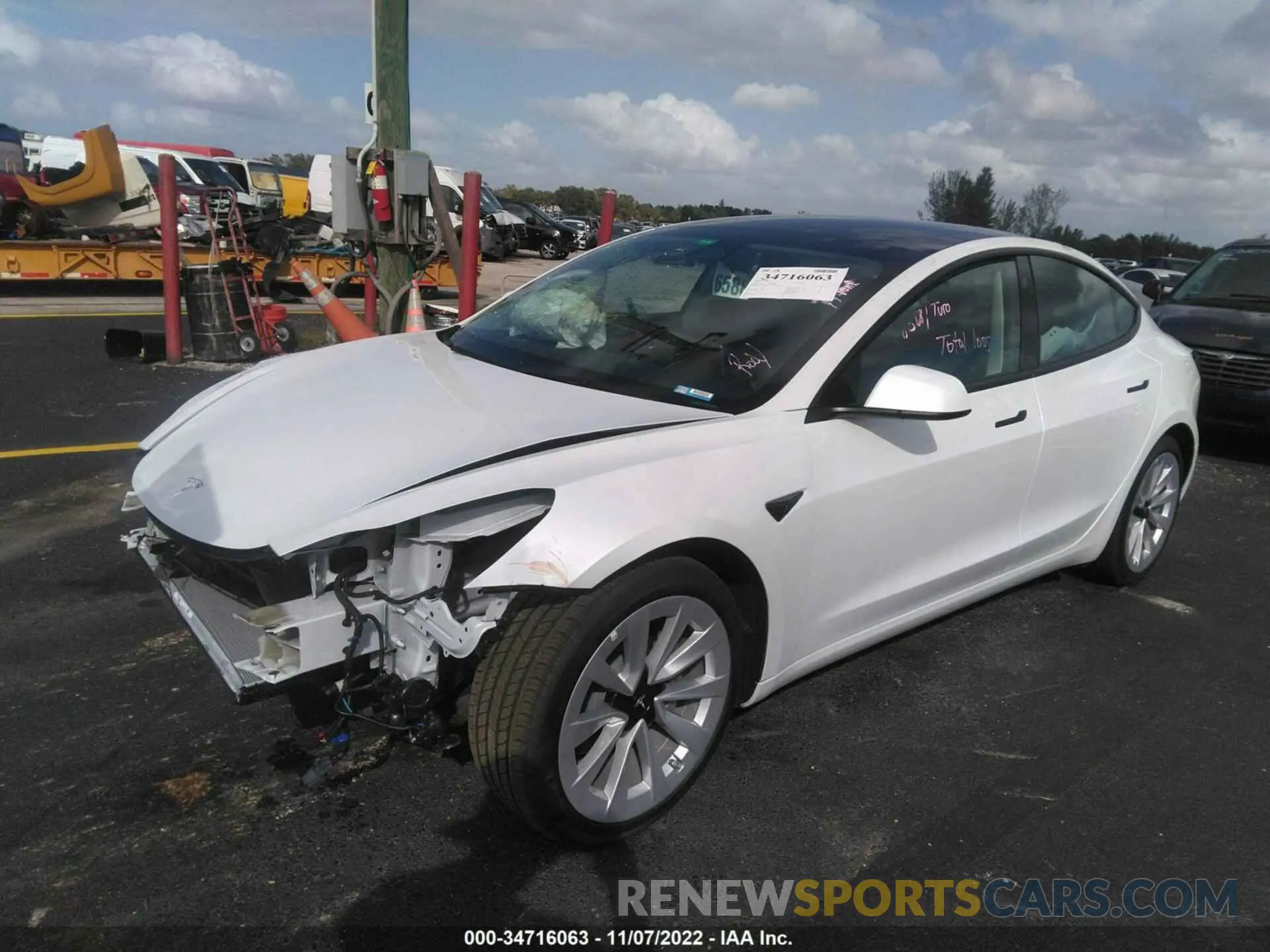 2 Photograph of a damaged car 5YJ3E1EA4NF338080 TESLA MODEL 3 2022