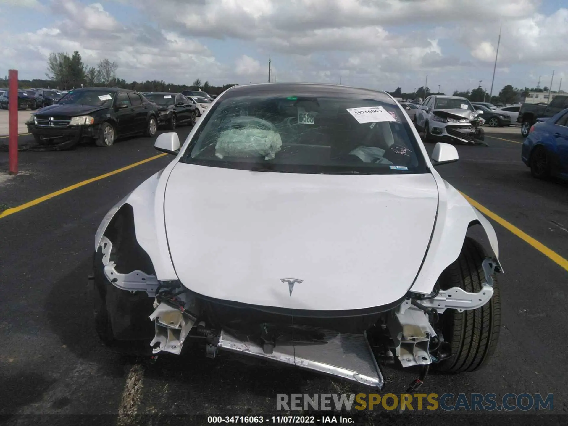 6 Photograph of a damaged car 5YJ3E1EA4NF338080 TESLA MODEL 3 2022