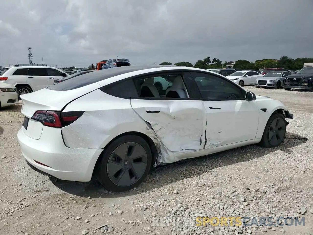 3 Photograph of a damaged car 5YJ3E1EA4NF345630 TESLA MODEL 3 2022