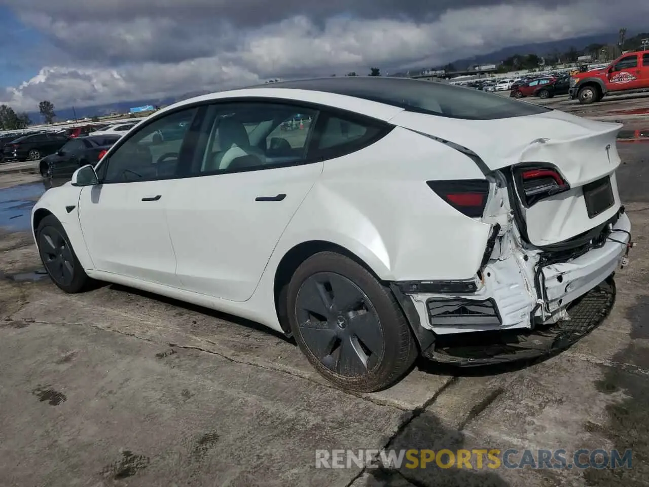 2 Photograph of a damaged car 5YJ3E1EA4NF354750 TESLA MODEL 3 2022