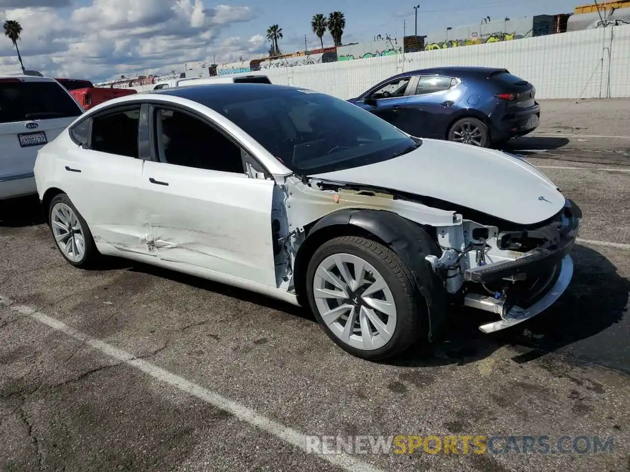 4 Photograph of a damaged car 5YJ3E1EA4NF359320 TESLA MODEL 3 2022