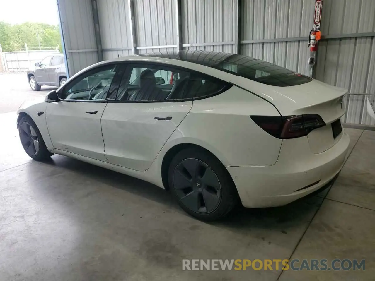 2 Photograph of a damaged car 5YJ3E1EA4NF368874 TESLA MODEL 3 2022