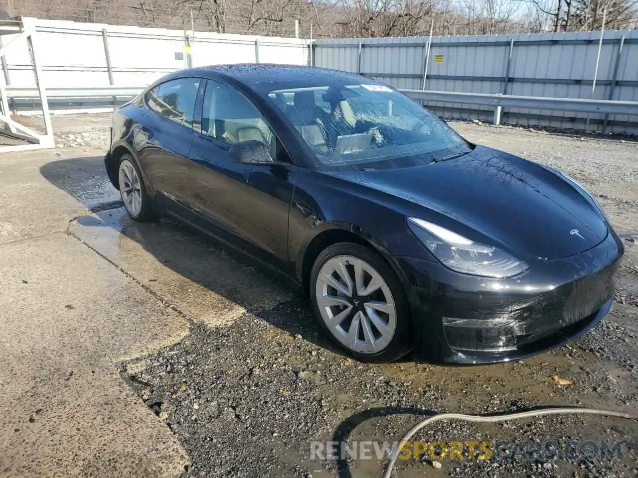 4 Photograph of a damaged car 5YJ3E1EA4NF370947 TESLA MODEL 3 2022