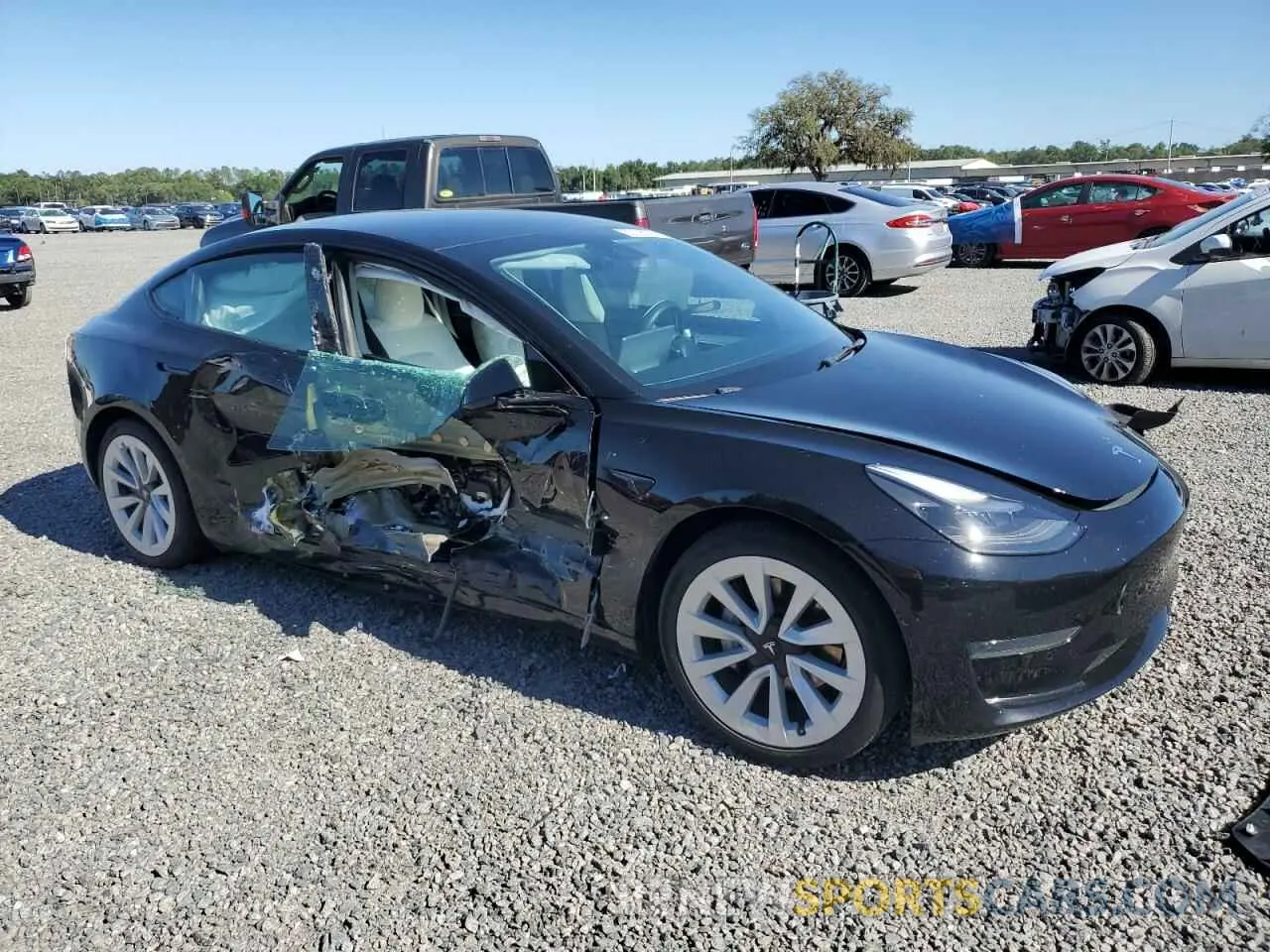 4 Photograph of a damaged car 5YJ3E1EA5NF102554 TESLA MODEL 3 2022