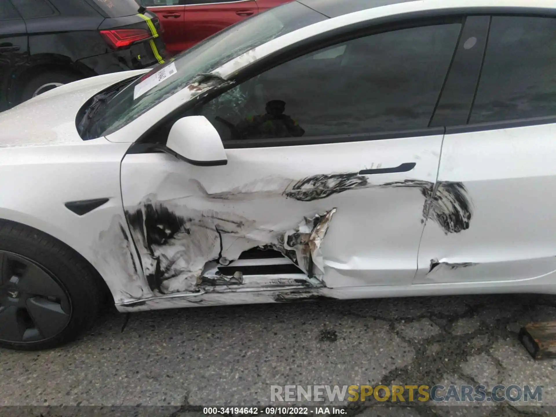 6 Photograph of a damaged car 5YJ3E1EA5NF121055 TESLA MODEL 3 2022