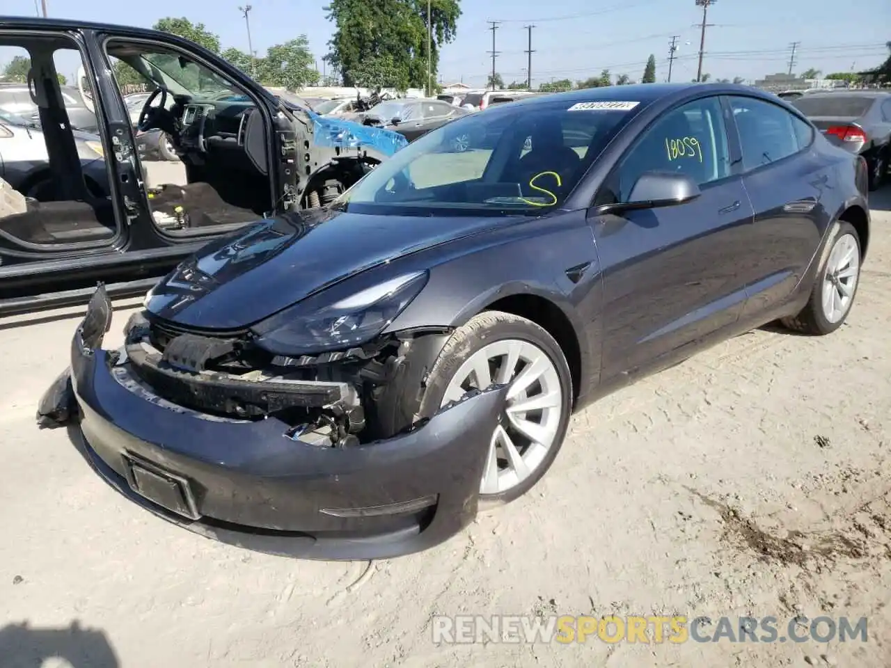 2 Photograph of a damaged car 5YJ3E1EA5NF144545 TESLA MODEL 3 2022