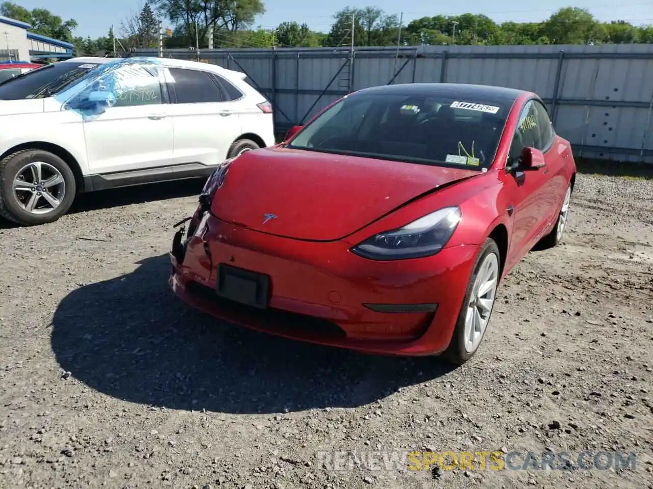 2 Photograph of a damaged car 5YJ3E1EA5NF184897 TESLA MODEL 3 2022