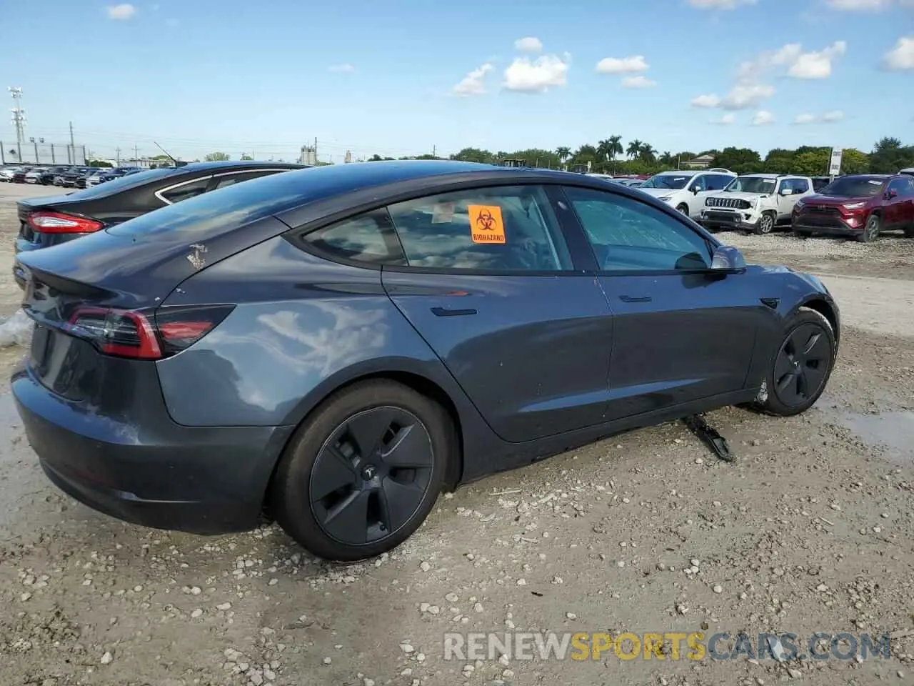 3 Photograph of a damaged car 5YJ3E1EA5NF186665 TESLA MODEL 3 2022