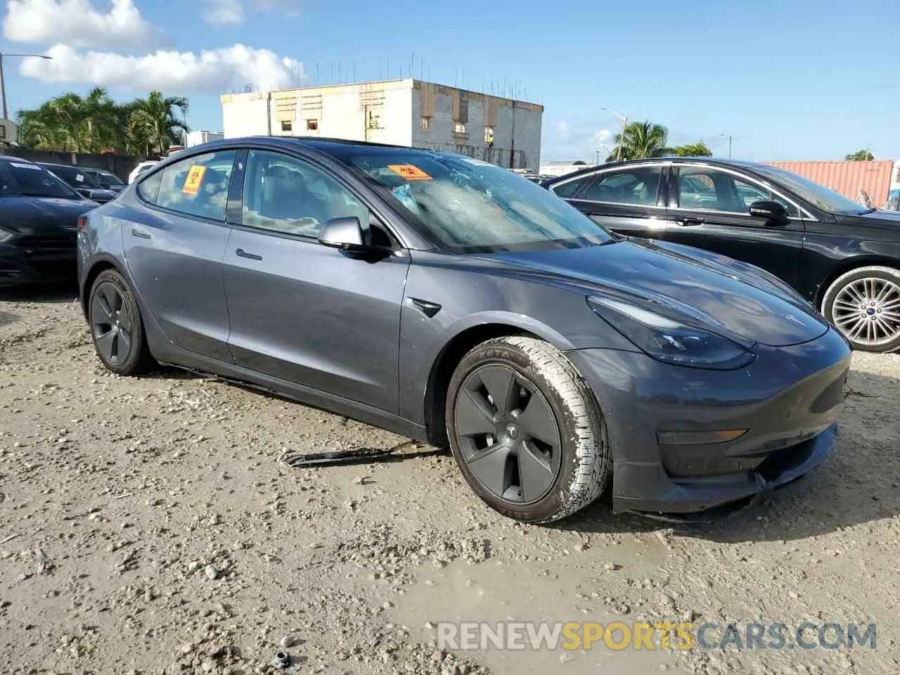 4 Photograph of a damaged car 5YJ3E1EA5NF186665 TESLA MODEL 3 2022