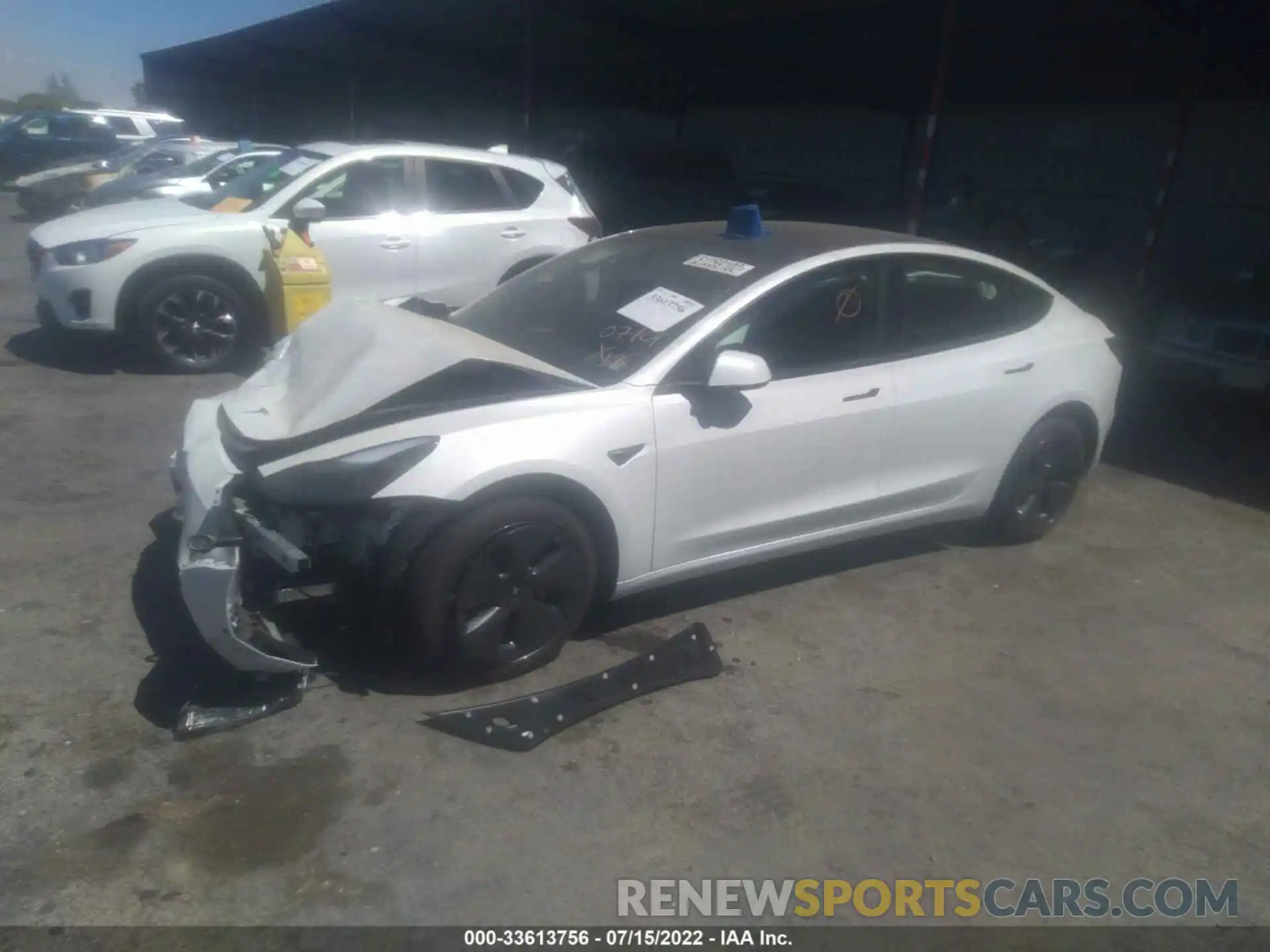 2 Photograph of a damaged car 5YJ3E1EA5NF207403 TESLA MODEL 3 2022