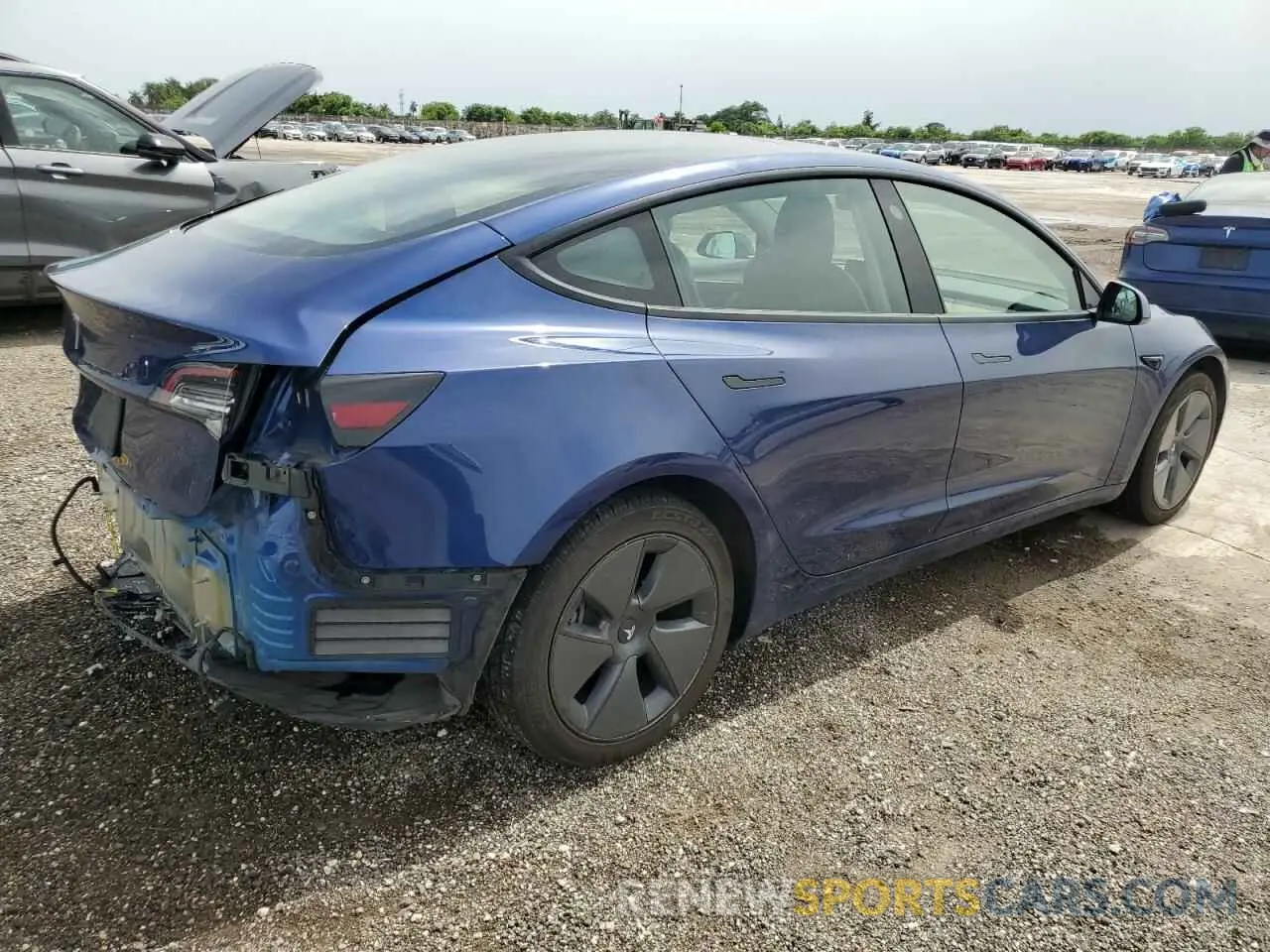 3 Photograph of a damaged car 5YJ3E1EA5NF285552 TESLA MODEL 3 2022