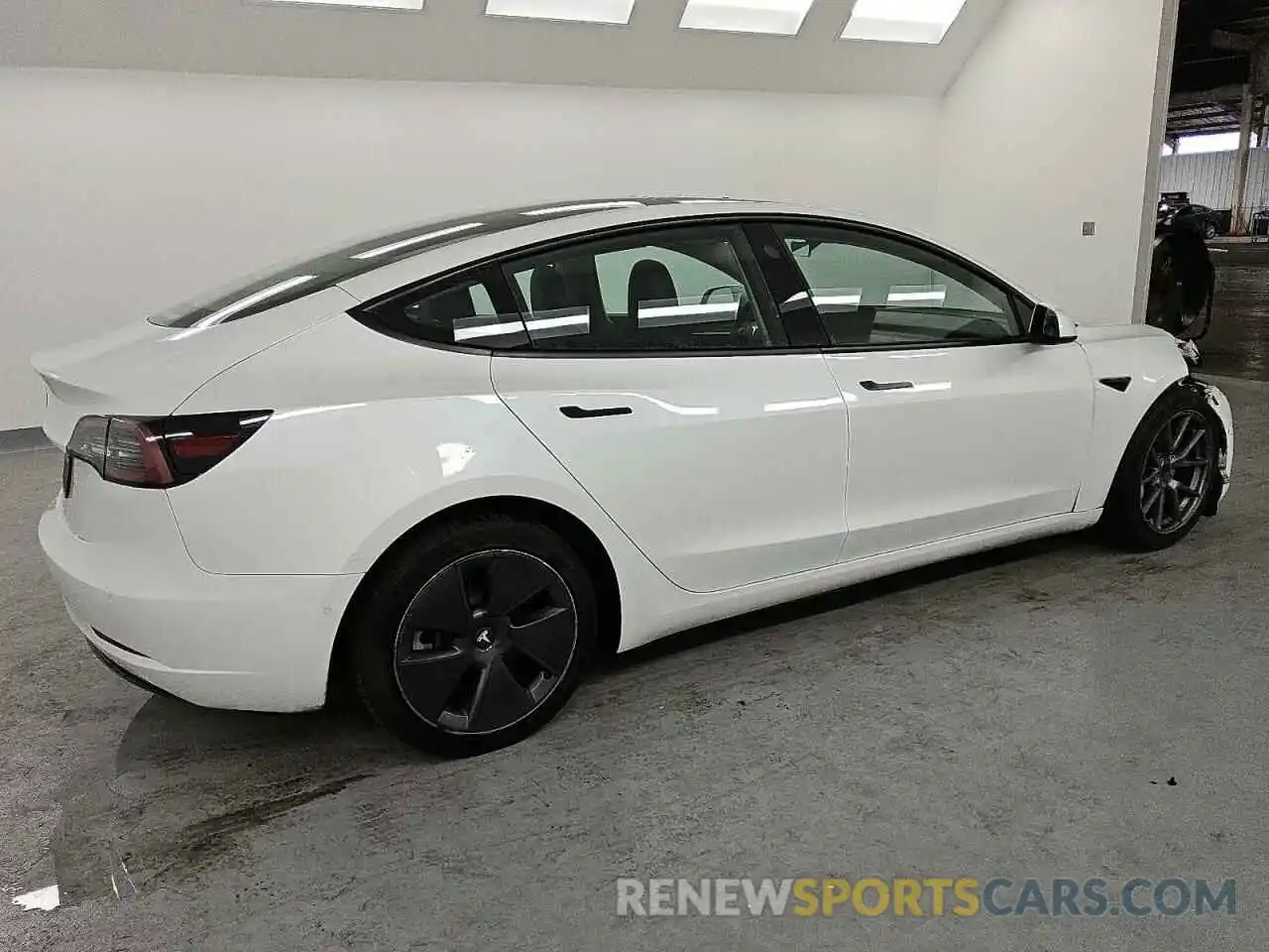 3 Photograph of a damaged car 5YJ3E1EA5NF289715 TESLA MODEL 3 2022