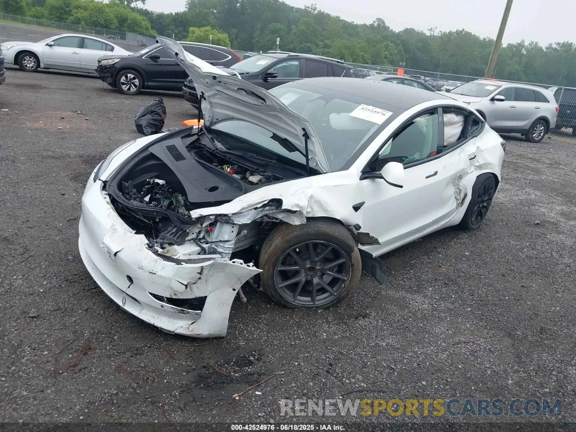 2 Photograph of a damaged car 5YJ3E1EA5NF305301 TESLA MODEL 3 2022