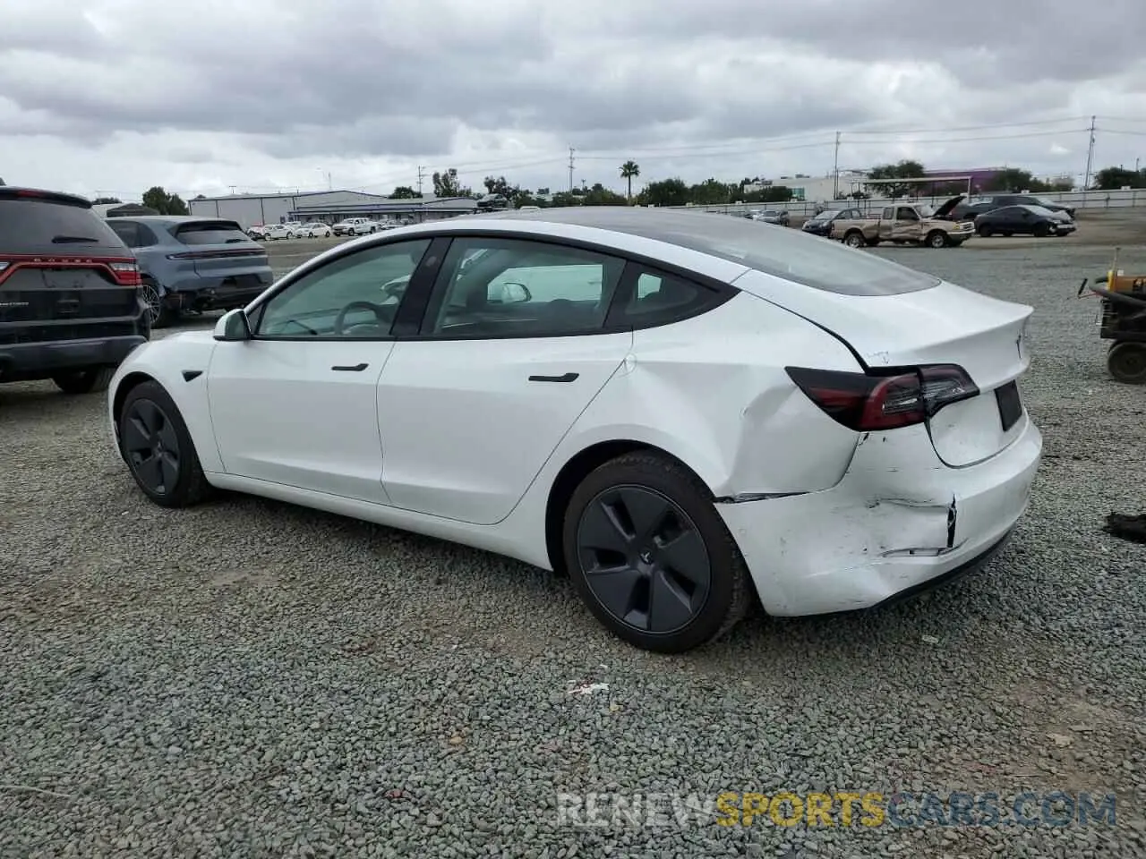 2 Photograph of a damaged car 5YJ3E1EA5NF321935 TESLA MODEL 3 2022