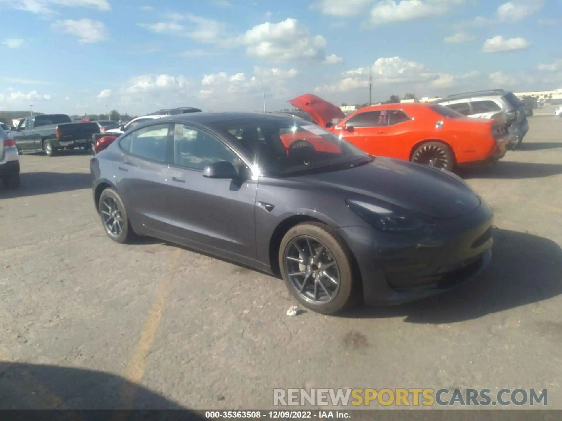 1 Photograph of a damaged car 5YJ3E1EA5NF322390 TESLA MODEL 3 2022