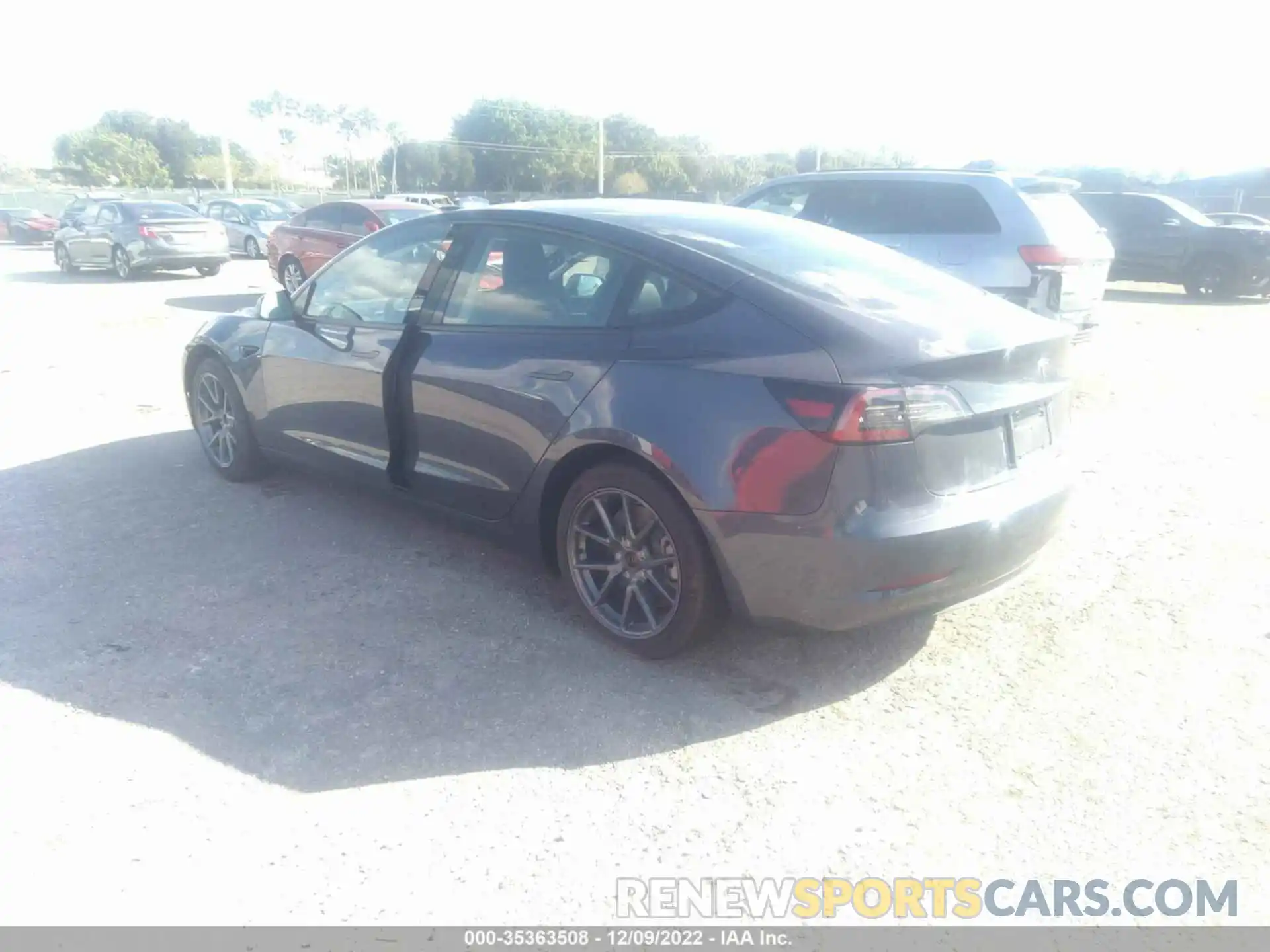 3 Photograph of a damaged car 5YJ3E1EA5NF322390 TESLA MODEL 3 2022