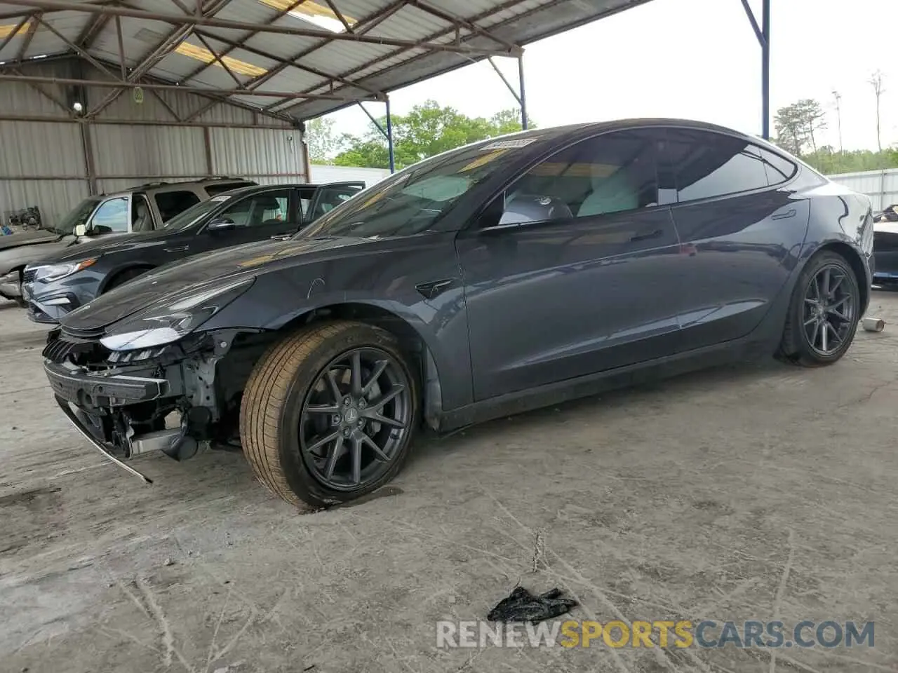 1 Photograph of a damaged car 5YJ3E1EA5NF326777 TESLA MODEL 3 2022