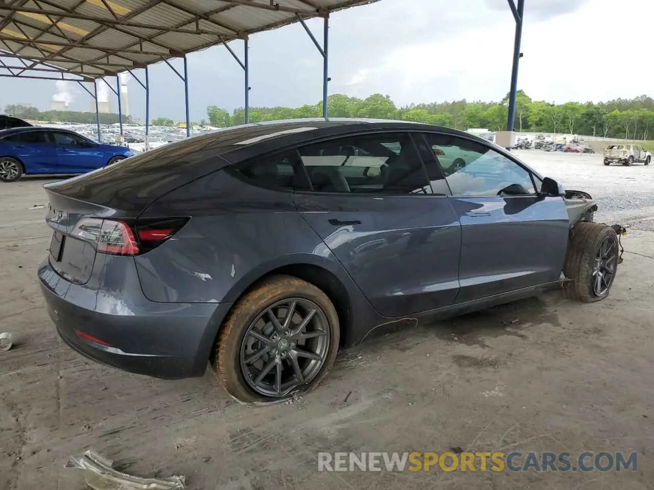 3 Photograph of a damaged car 5YJ3E1EA5NF326777 TESLA MODEL 3 2022