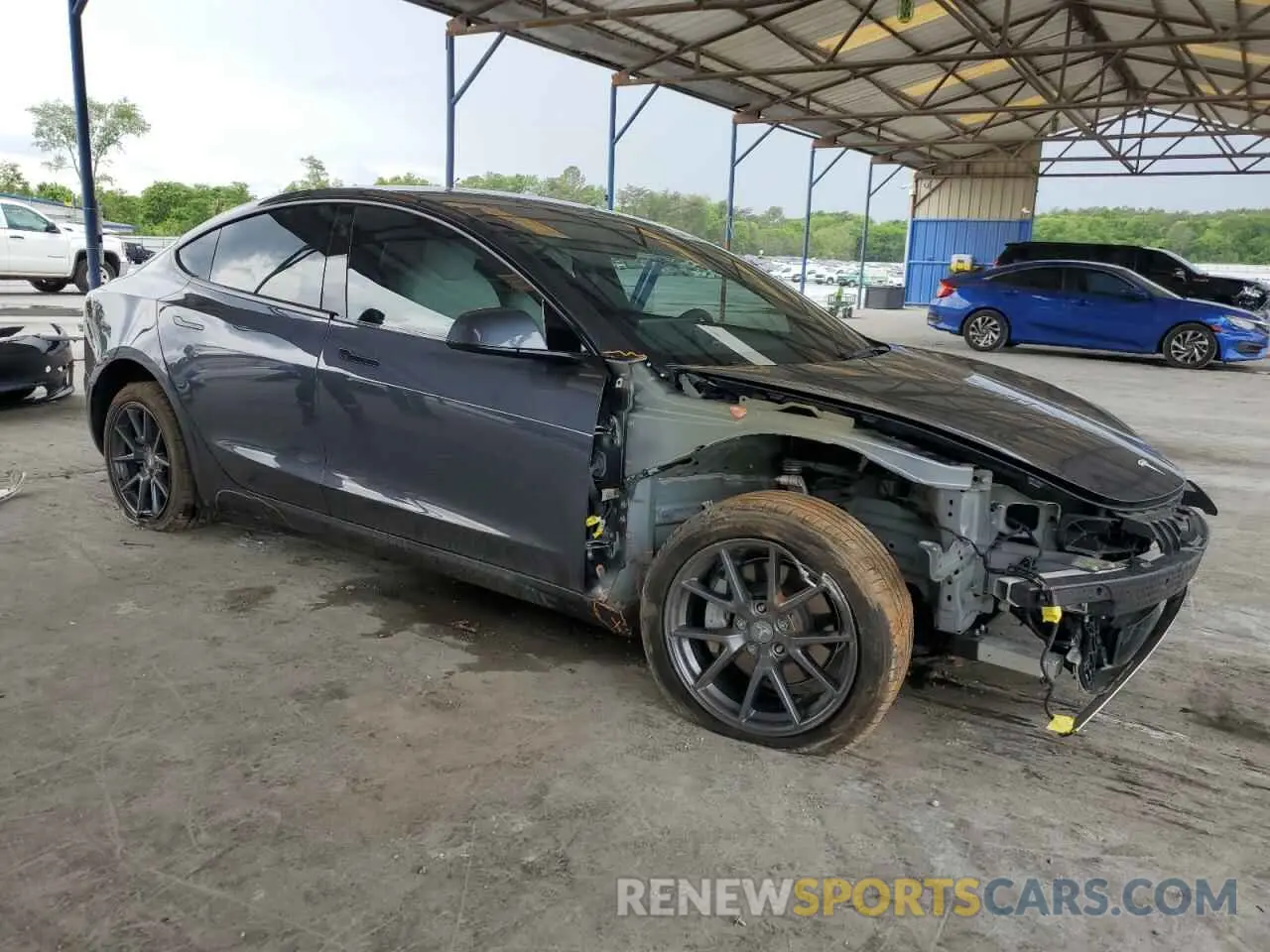 4 Photograph of a damaged car 5YJ3E1EA5NF326777 TESLA MODEL 3 2022