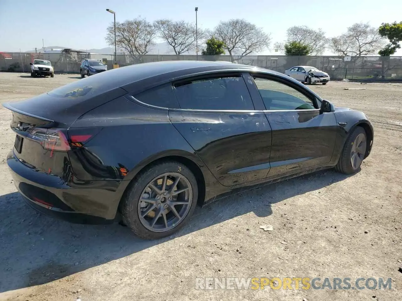3 Photograph of a damaged car 5YJ3E1EA5NF329811 TESLA MODEL 3 2022