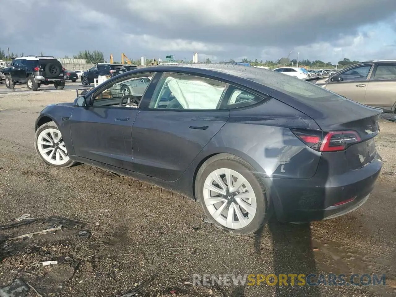 2 Photograph of a damaged car 5YJ3E1EA5NF331641 TESLA MODEL 3 2022