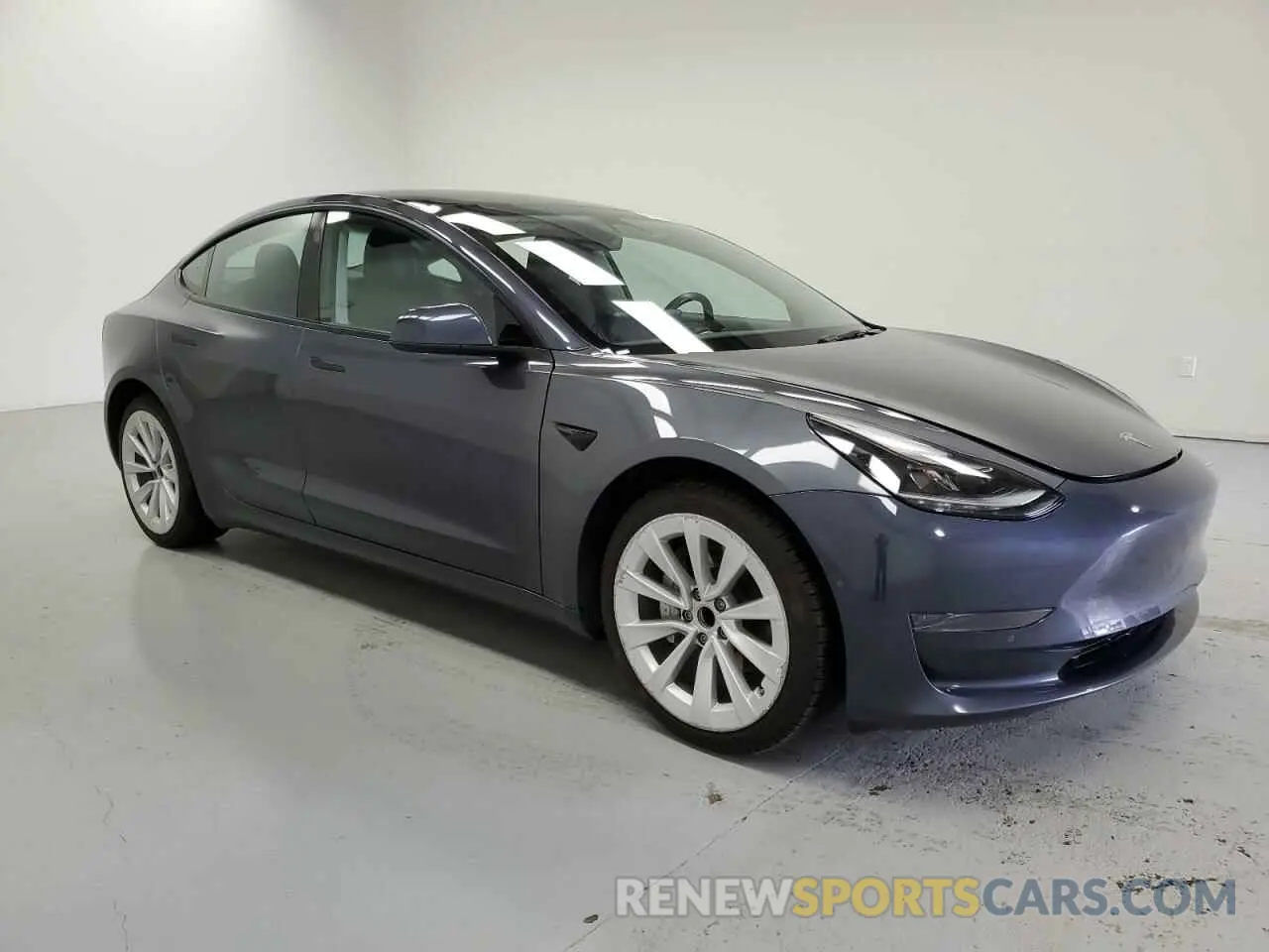 4 Photograph of a damaged car 5YJ3E1EA5NF371489 TESLA MODEL 3 2022