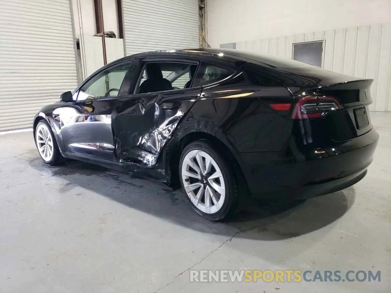 2 Photograph of a damaged car 5YJ3E1EA5NF372030 TESLA MODEL 3 2022