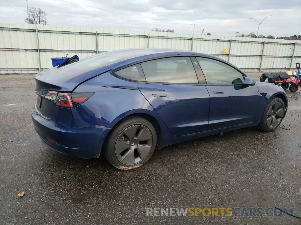 3 Photograph of a damaged car 5YJ3E1EA5NF373100 TESLA MODEL 3 2022