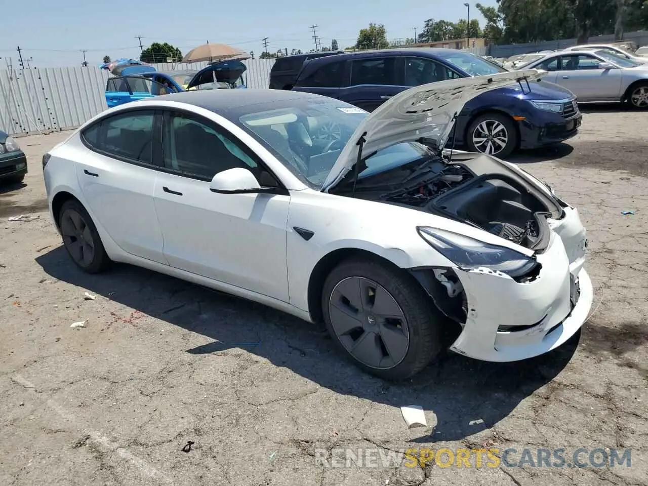 4 Photograph of a damaged car 5YJ3E1EA5NF375963 TESLA MODEL 3 2022