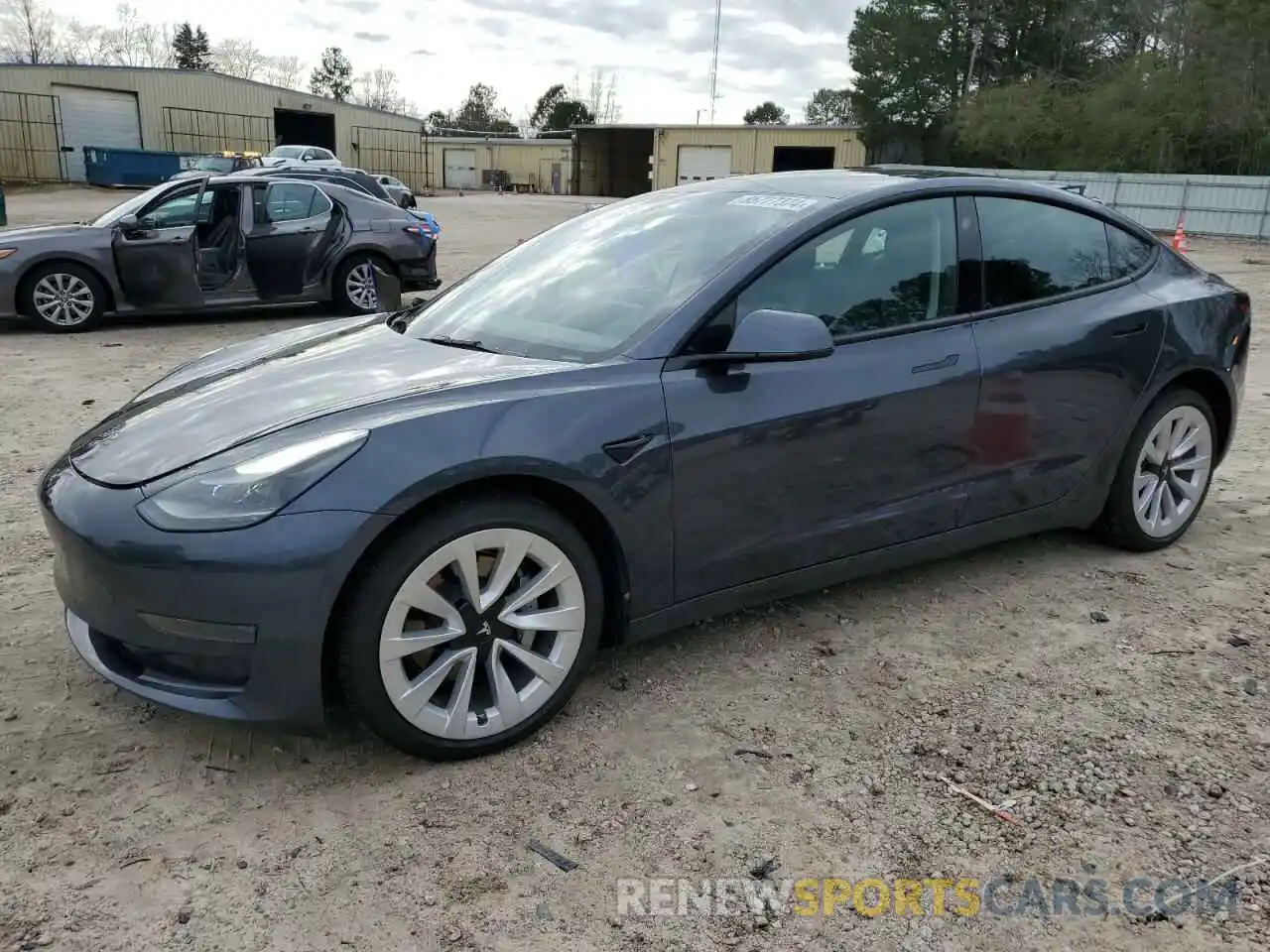 1 Photograph of a damaged car 5YJ3E1EA6NF119153 TESLA MODEL 3 2022