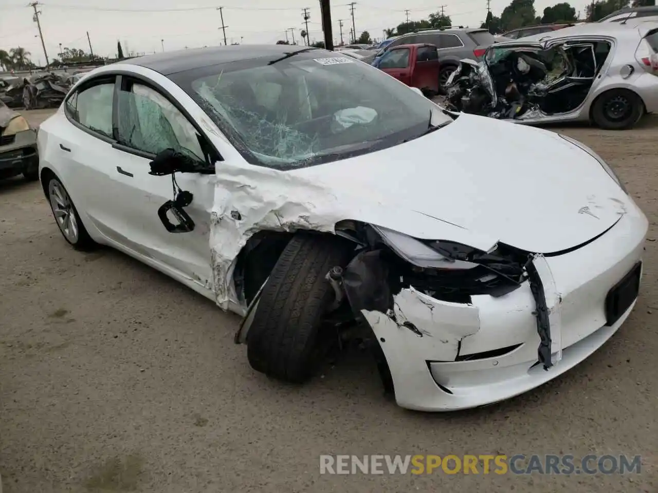 1 Photograph of a damaged car 5YJ3E1EA6NF143887 TESLA MODEL 3 2022