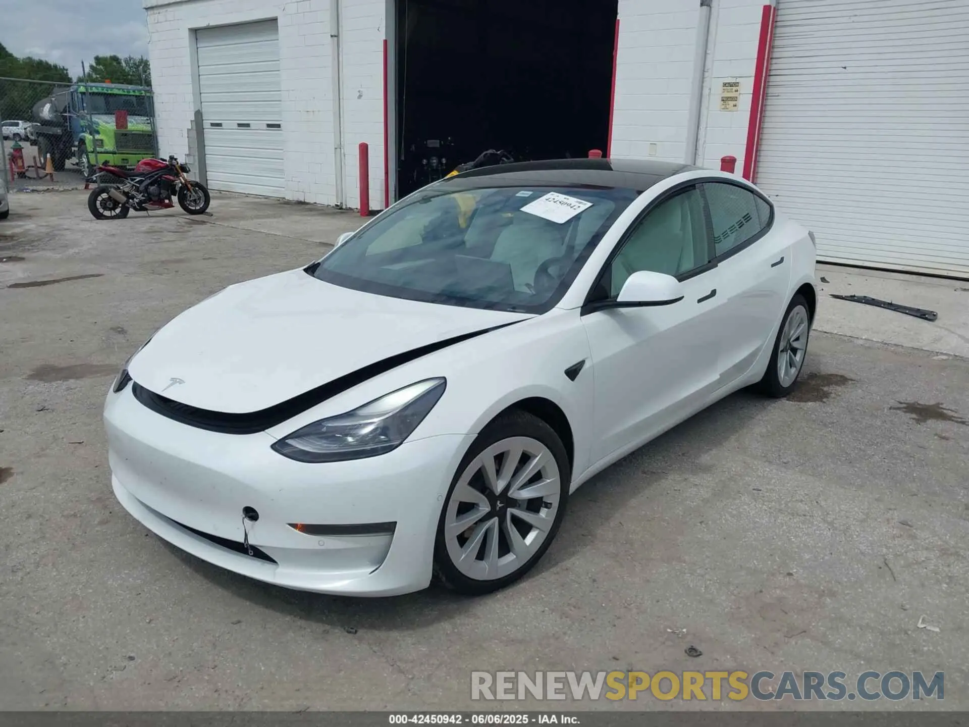 2 Photograph of a damaged car 5YJ3E1EA6NF153853 TESLA MODEL 3 2022