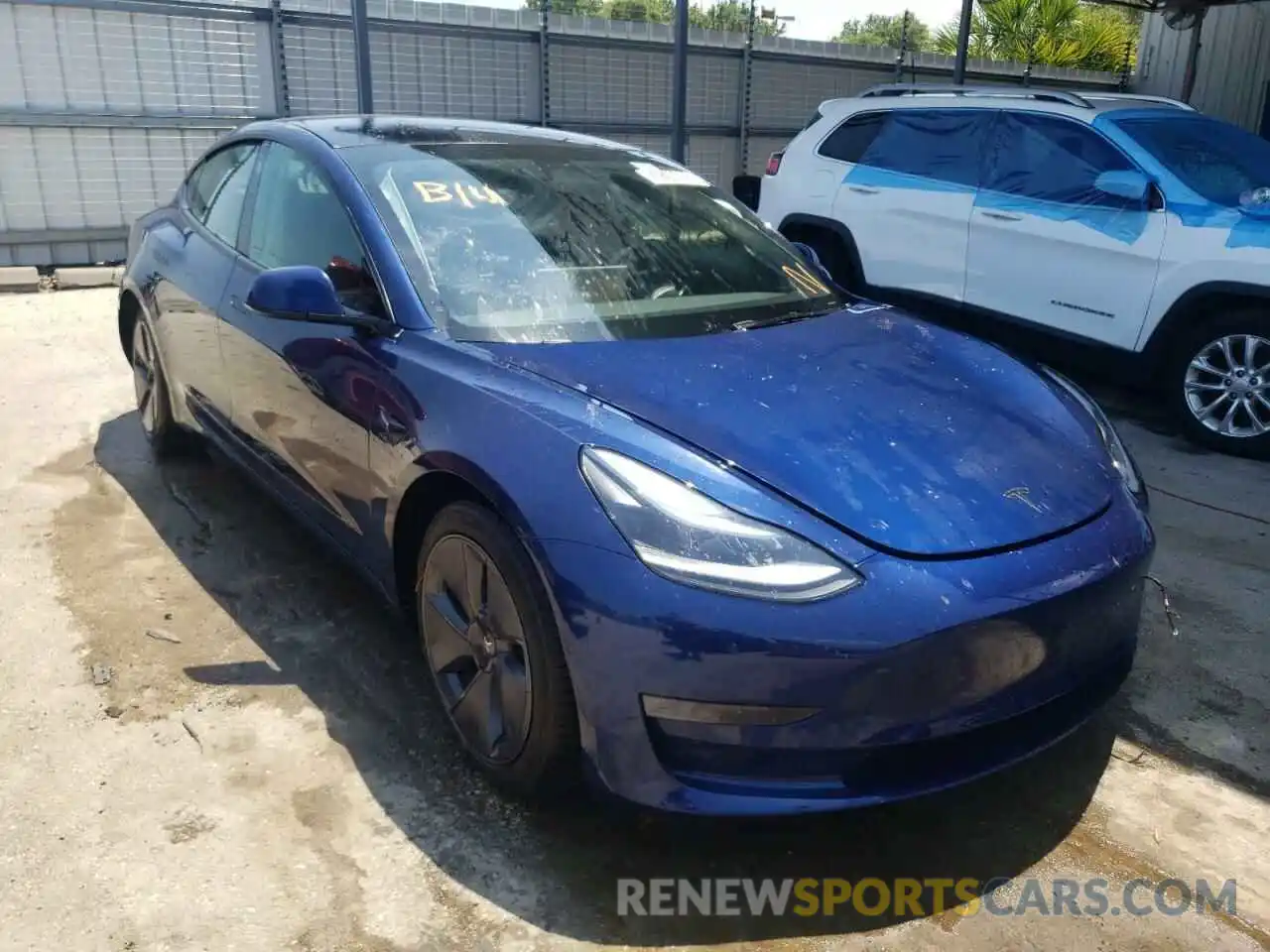 1 Photograph of a damaged car 5YJ3E1EA6NF188151 TESLA MODEL 3 2022