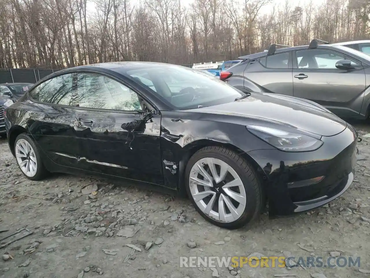 4 Photograph of a damaged car 5YJ3E1EA6NF188277 TESLA MODEL 3 2022