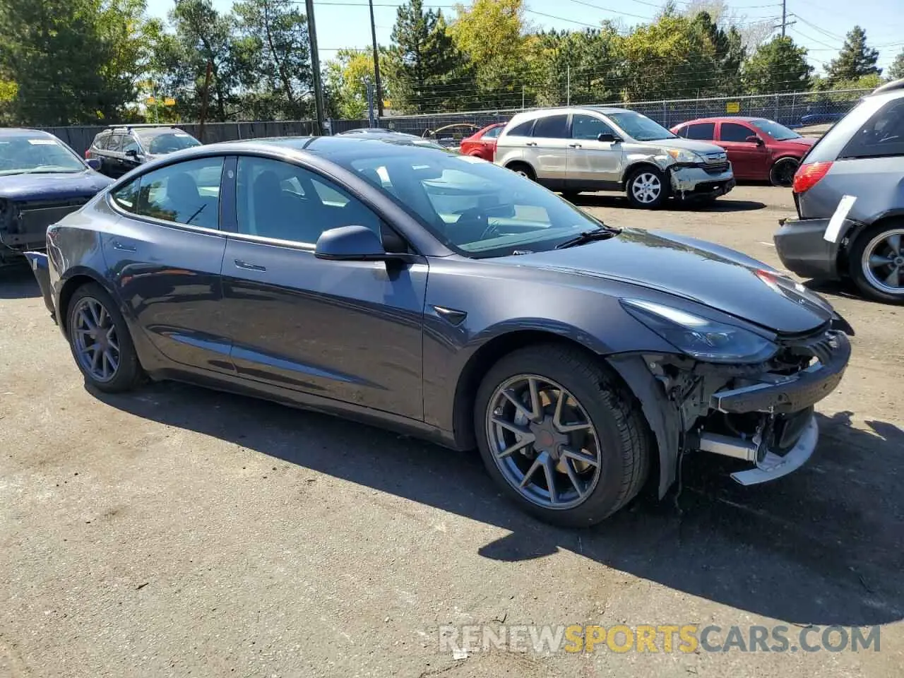 4 Photograph of a damaged car 5YJ3E1EA6NF189378 TESLA MODEL 3 2022