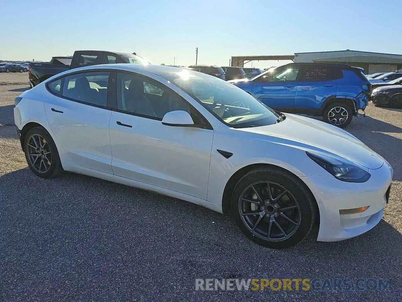 4 Photograph of a damaged car 5YJ3E1EA6NF189400 TESLA MODEL 3 2022