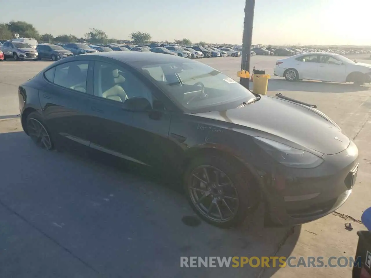 4 Photograph of a damaged car 5YJ3E1EA6NF189459 TESLA MODEL 3 2022