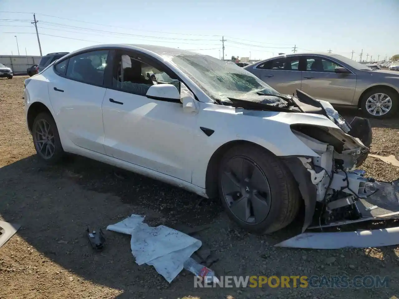 4 Photograph of a damaged car 5YJ3E1EA6NF191258 TESLA MODEL 3 2022