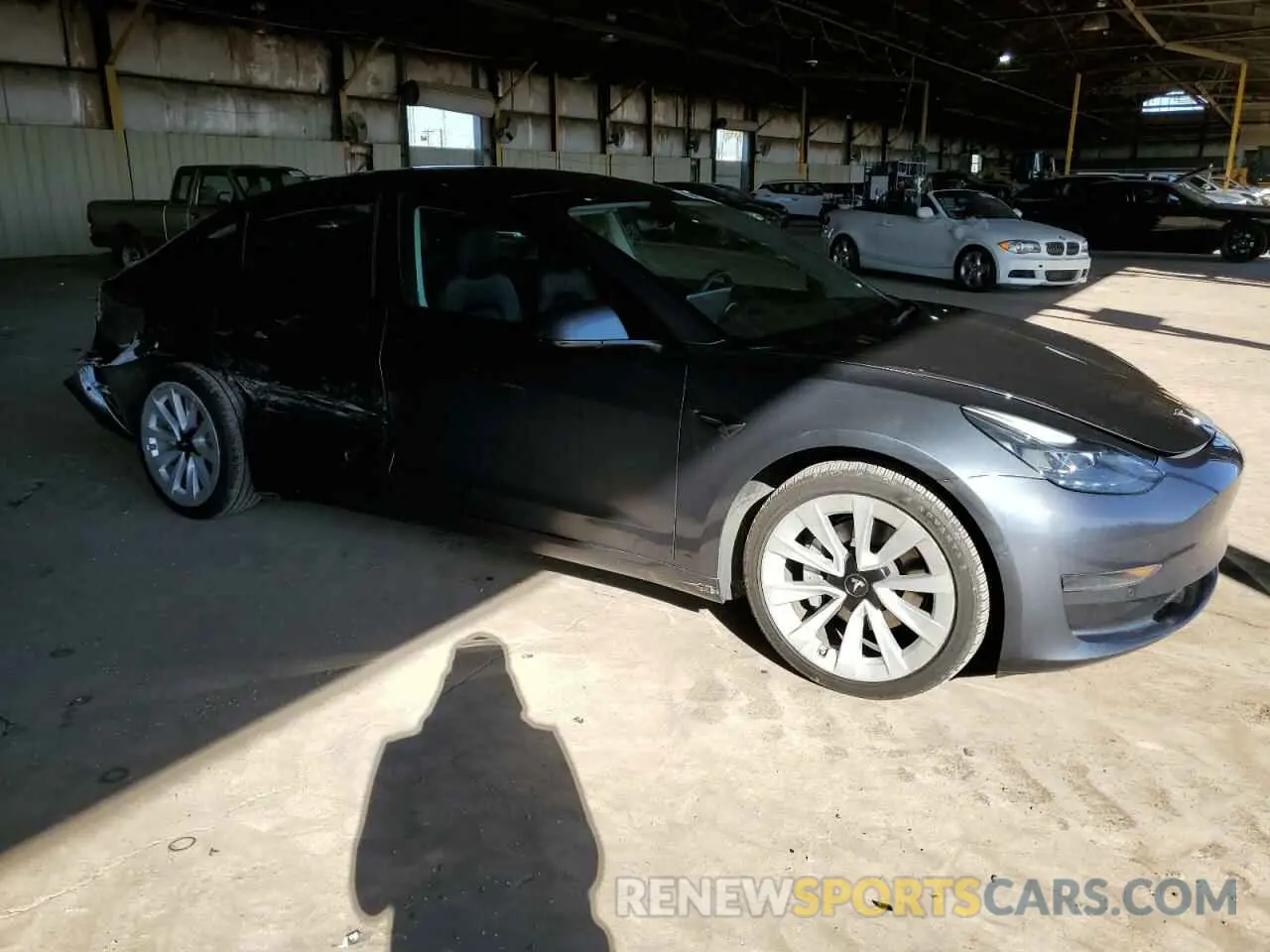 4 Photograph of a damaged car 5YJ3E1EA6NF191423 TESLA MODEL 3 2022