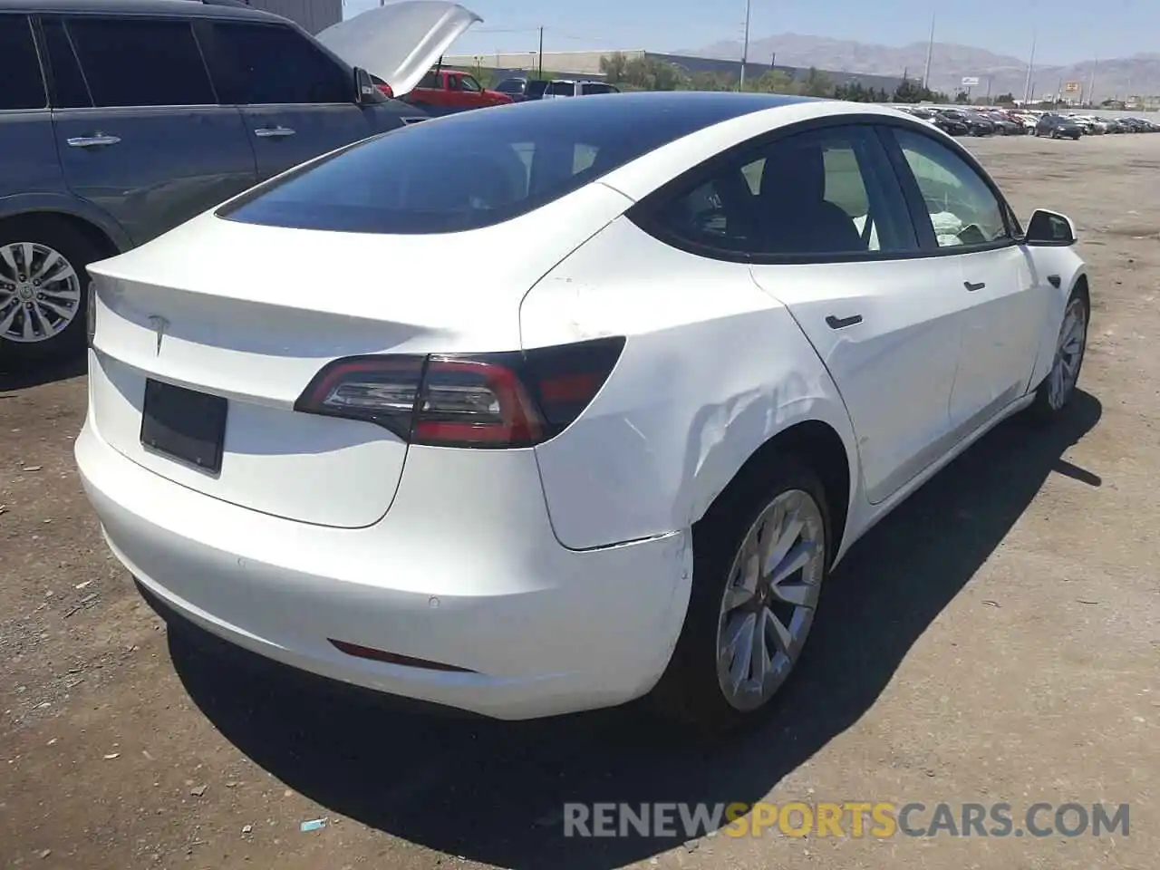 4 Photograph of a damaged car 5YJ3E1EA6NF208222 TESLA MODEL 3 2022