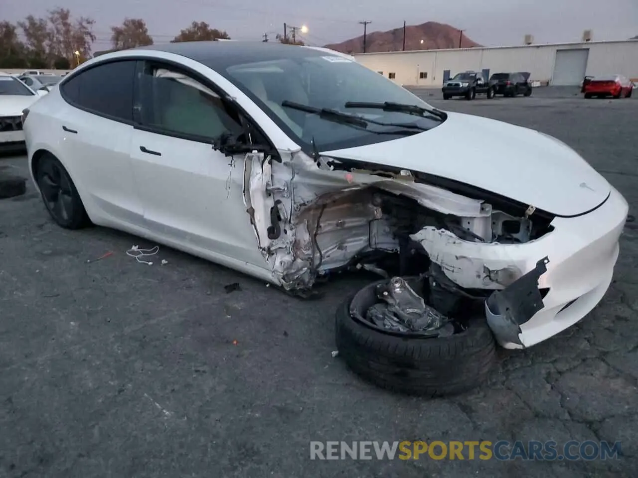 4 Photograph of a damaged car 5YJ3E1EA6NF237977 TESLA MODEL 3 2022