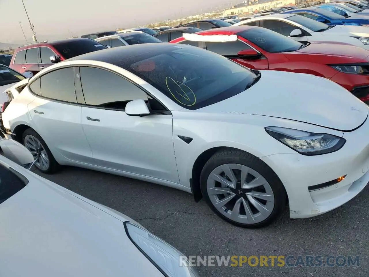 4 Photograph of a damaged car 5YJ3E1EA6NF257744 TESLA MODEL 3 2022