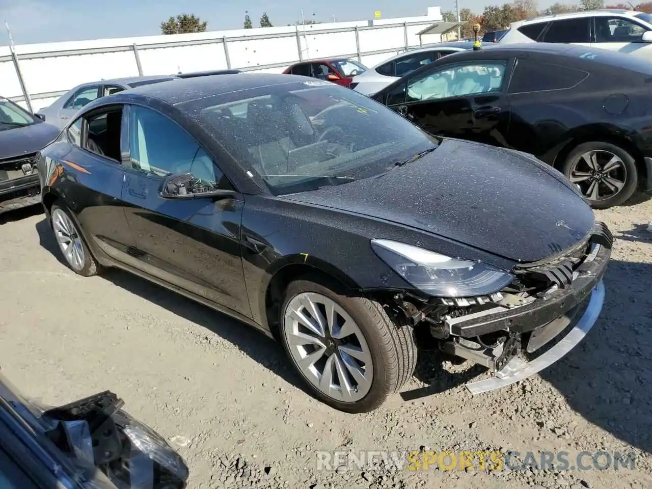 4 Photograph of a damaged car 5YJ3E1EA6NF303816 TESLA MODEL 3 2022